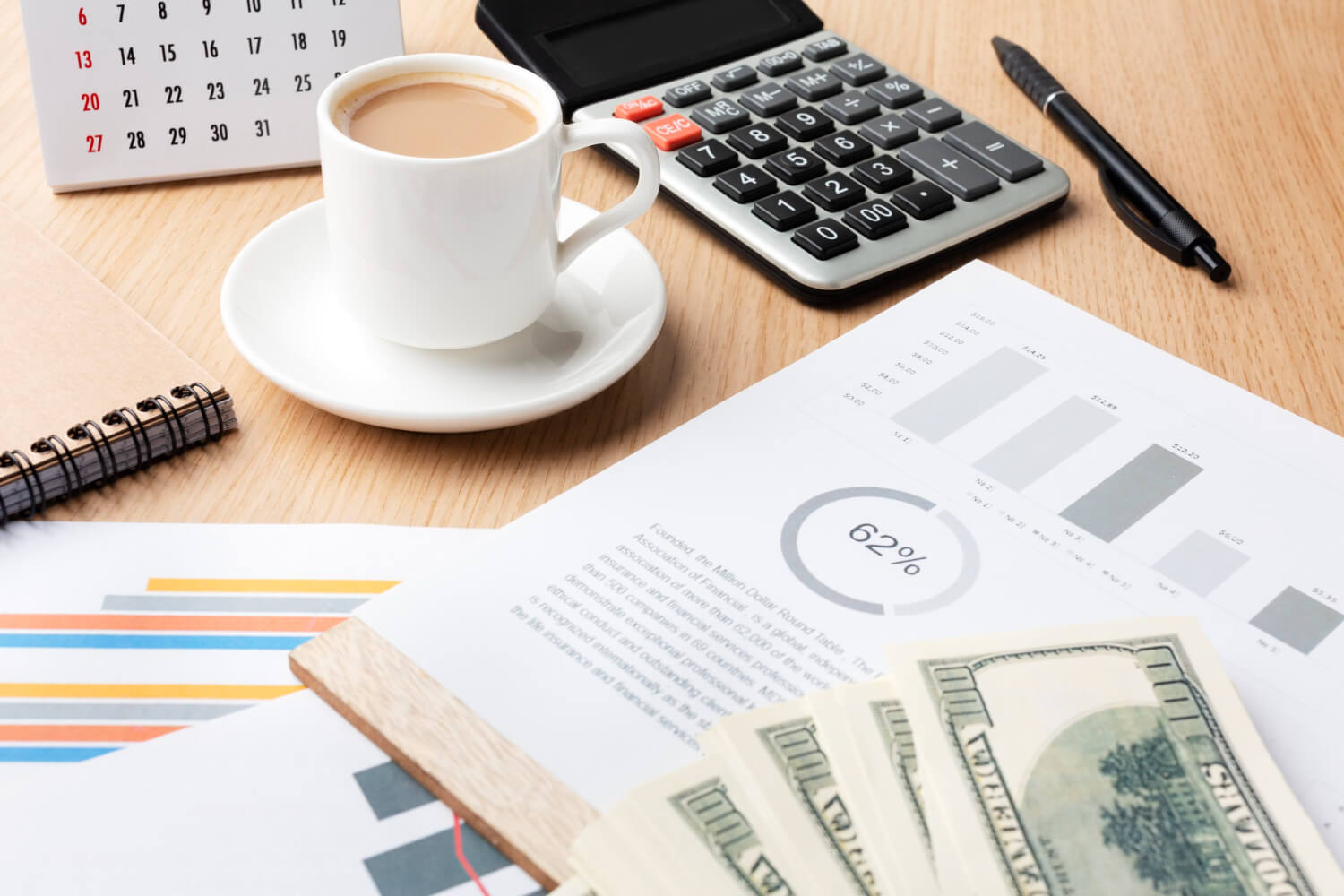 high-angle-desk-with-cash-coffee (1)